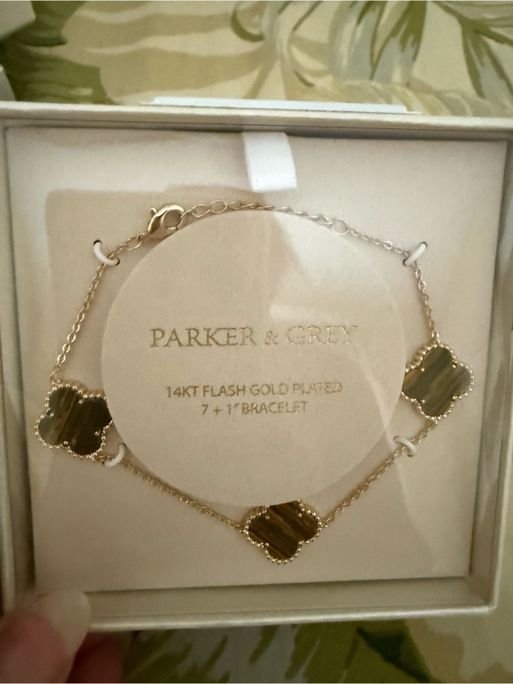 Gold-Plated Bracelet with Green Clover Accents